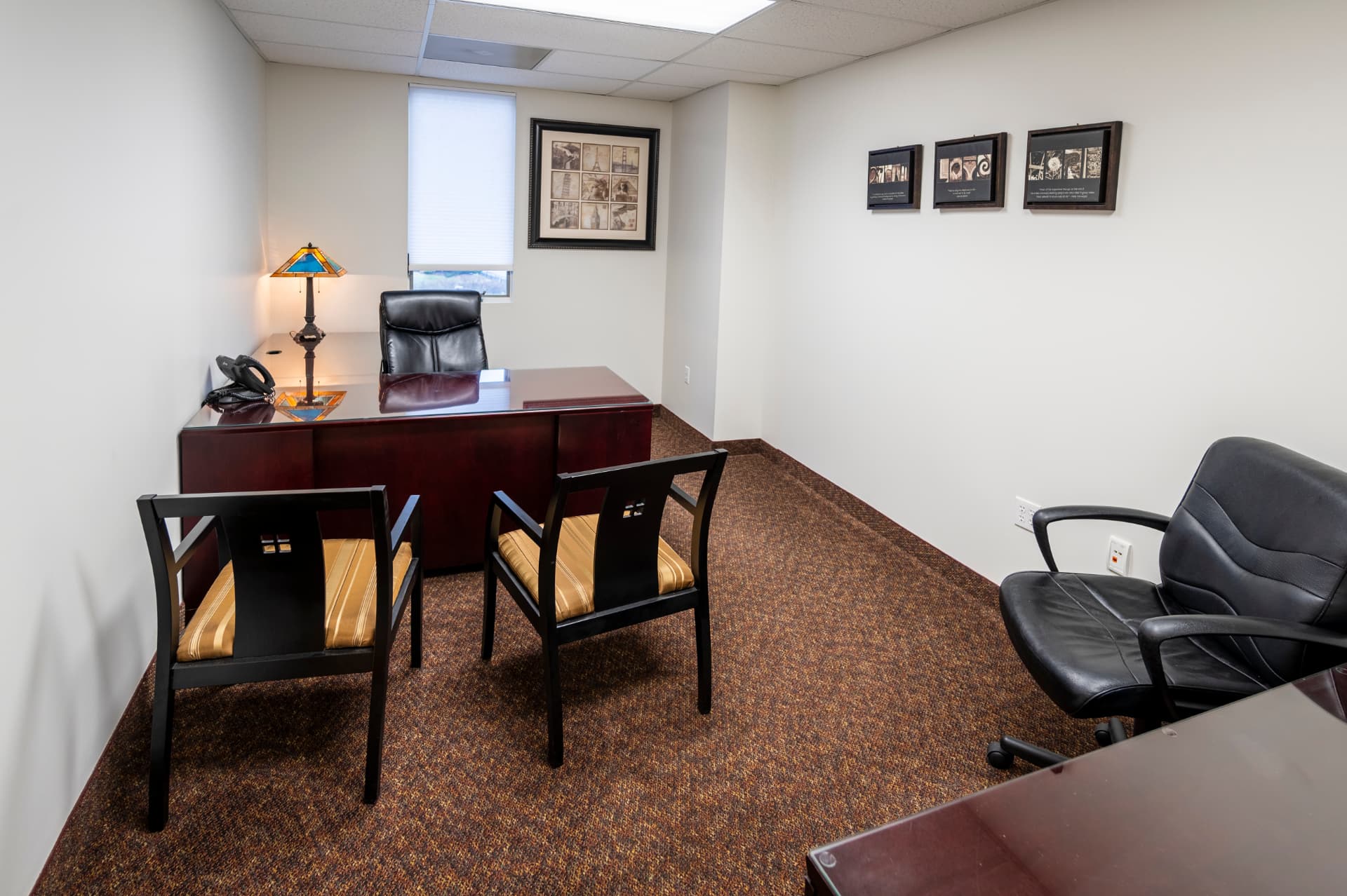 Executive office 301 with desk and guest seating
